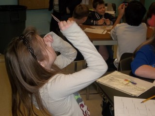 Kids learn about lights and lasers during hands-on science classes